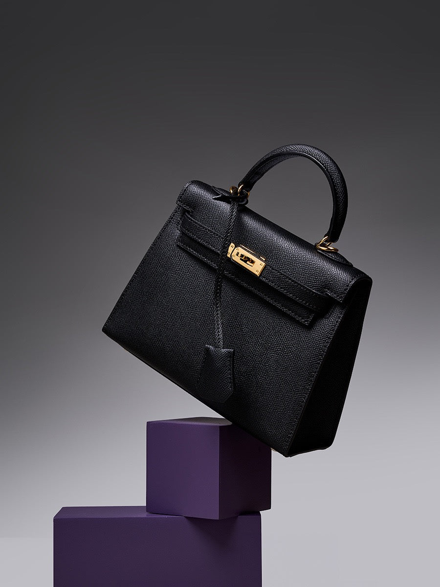 CELÉSTE Iconic Leather Top Handle Bag