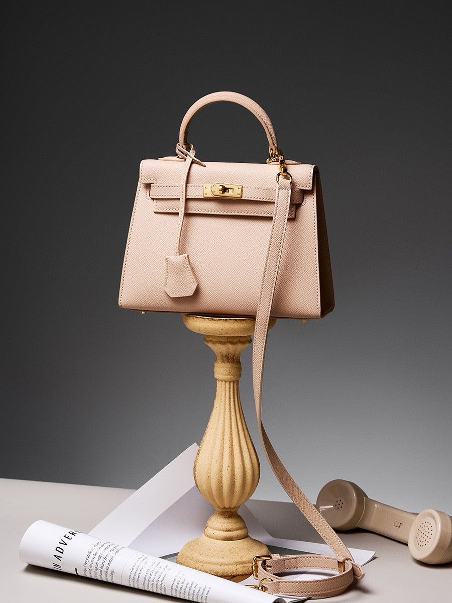 CELÉSTE Iconic Leather Top Handle Bag